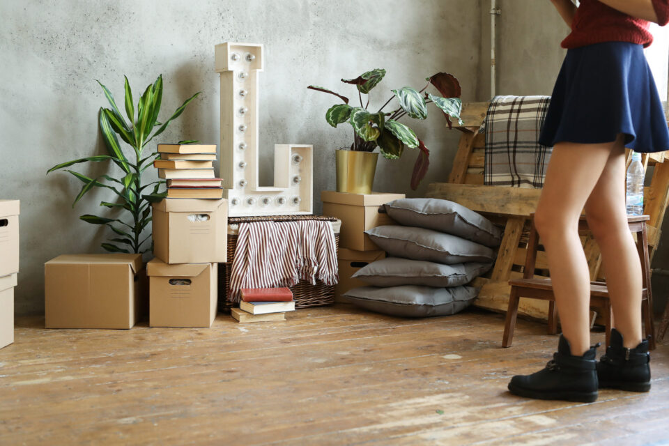 Young woman moving to new home